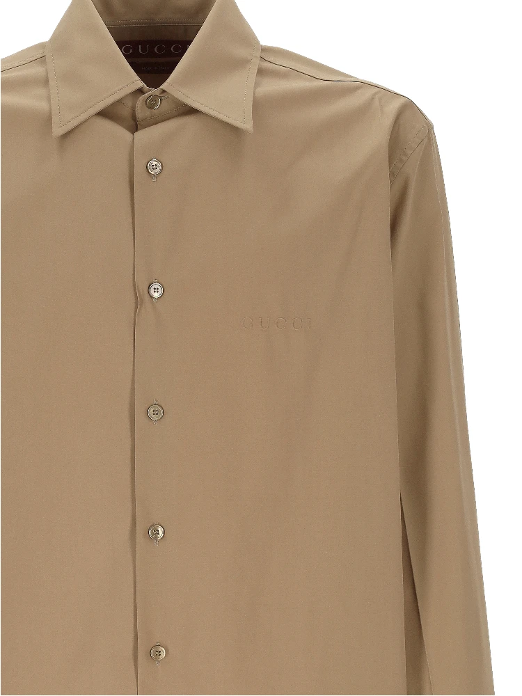 قمصان غوتشي alternative