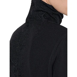 قمصان غوتشي سوداء