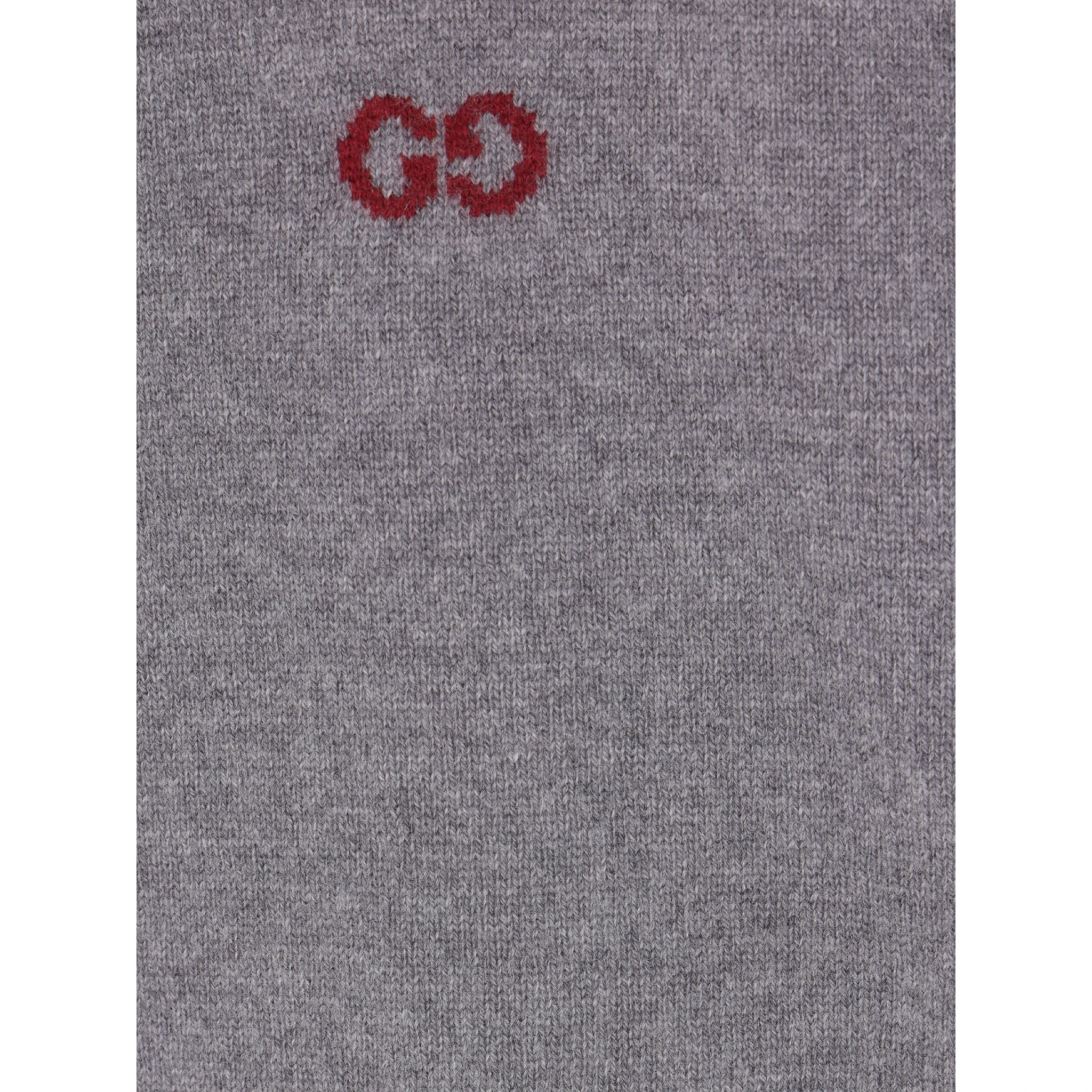 كنزات غوتشي رمادية