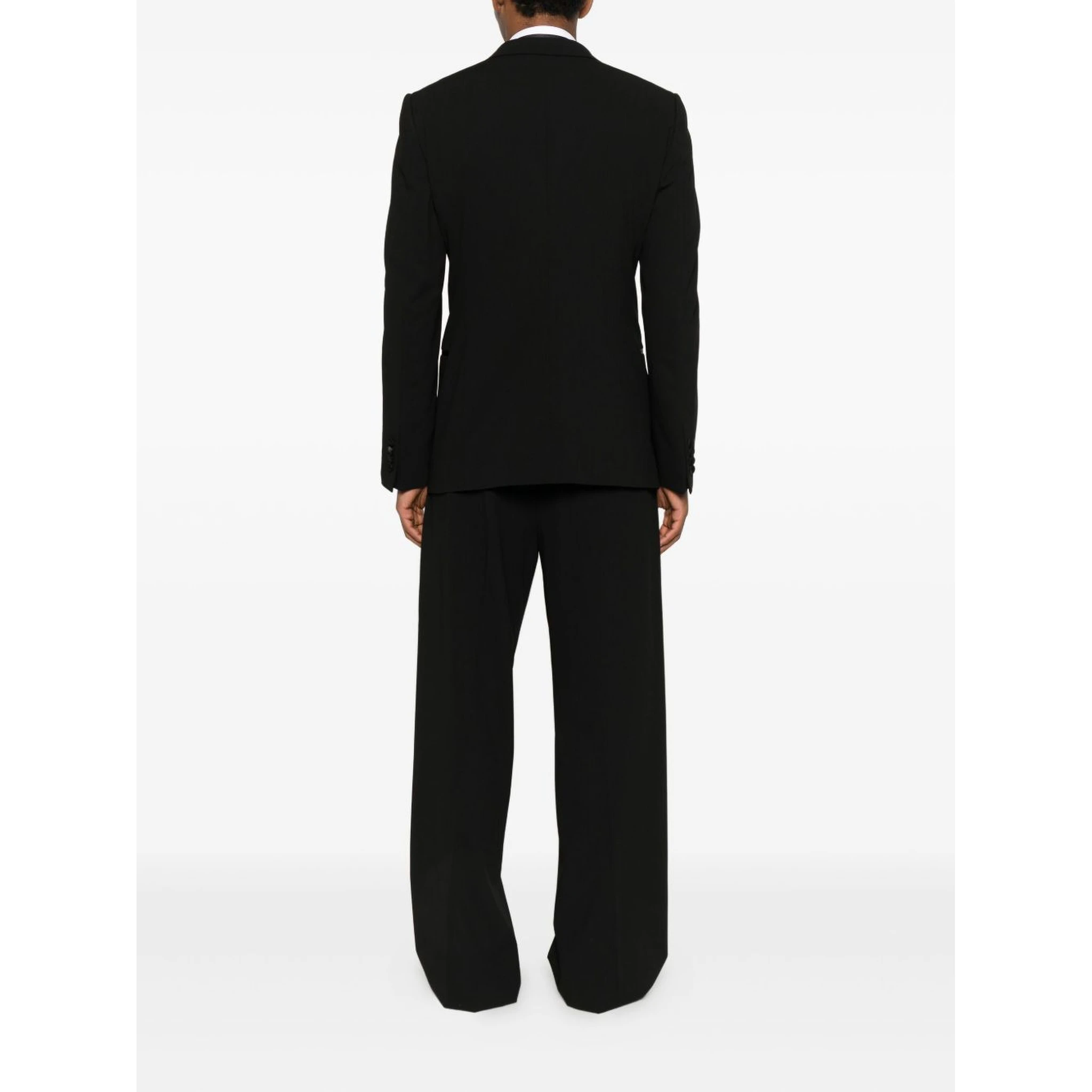 Double-breasted peak-lapel suit