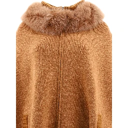 Cape with fur inserts