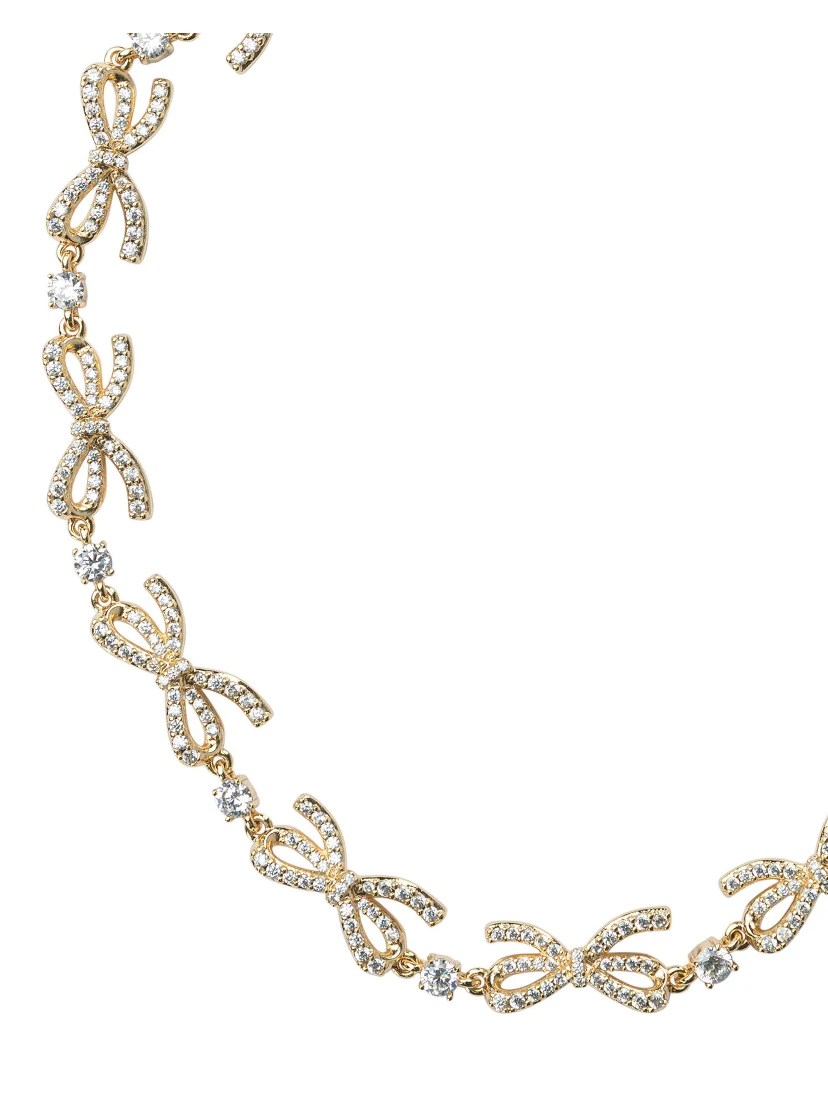 قلادة مزينة بفيونكات وكريستالات