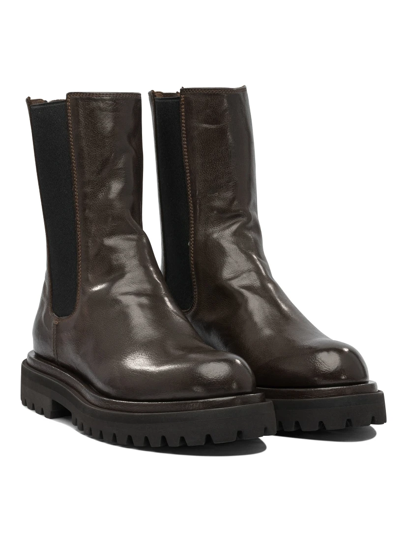 "Wisal DD 122" zippered ankle boots.