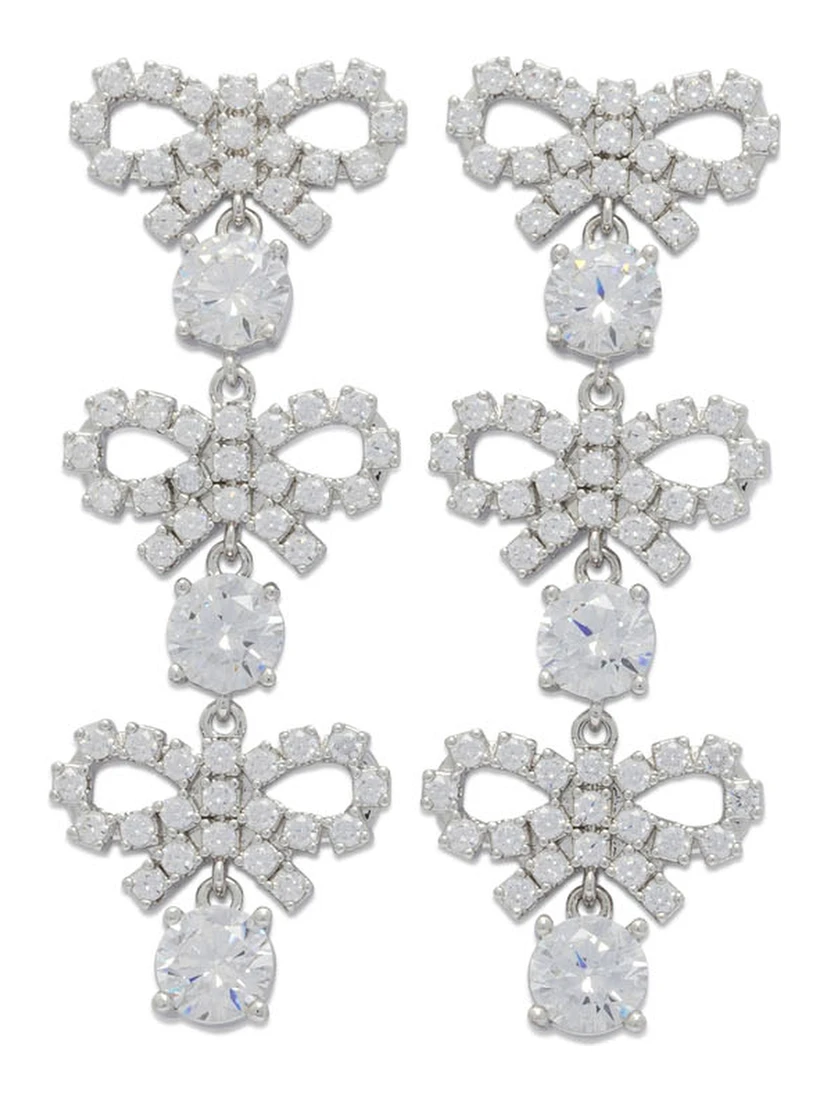 أقراط متدلية مزينة بفيونكات