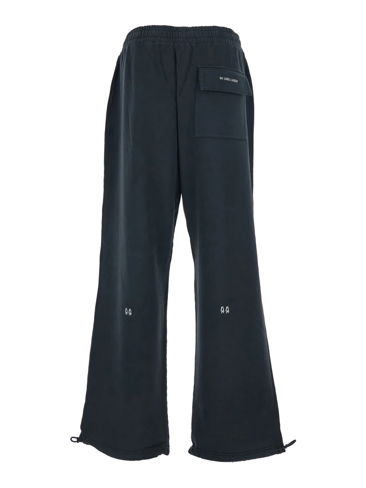 Black Pants with Elastic Waist and Drawstring Hem in Tech Fabric Man alternative