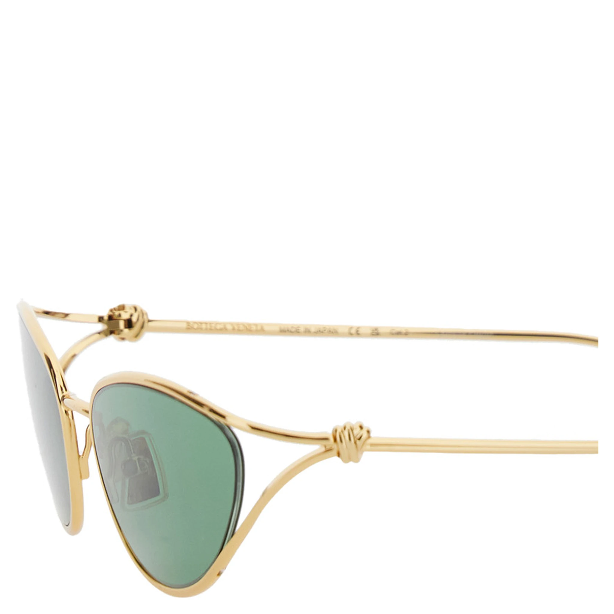 Green Sunglasses with Cat-Eye Design and Knot Detail on the Temples in Metal Woman