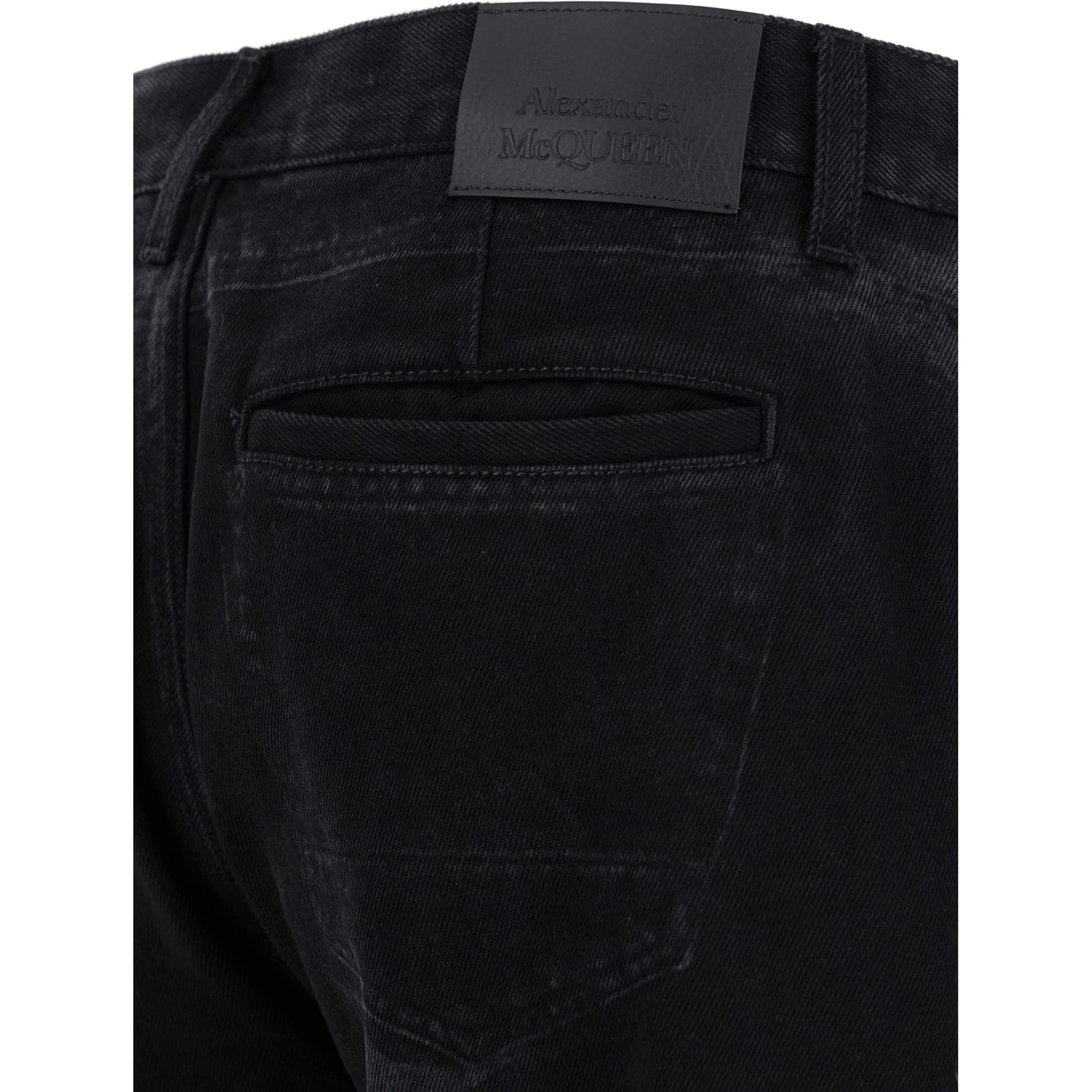 Black Jeans with Logo Patch on the Rear and Worn Out Effect in Denim Man
