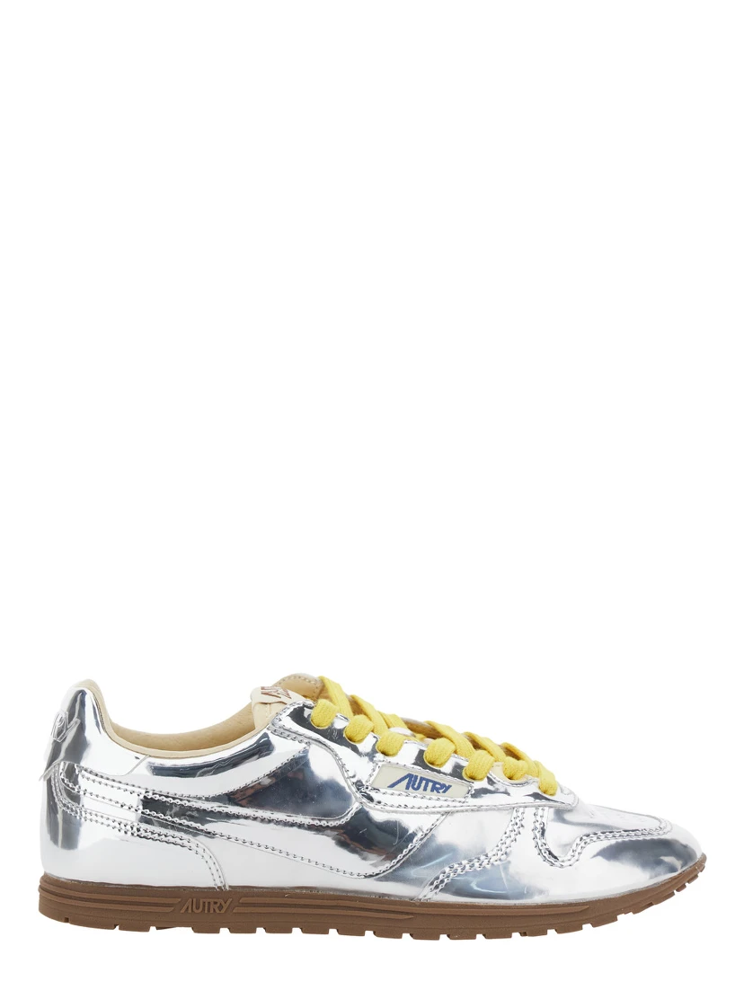 Windspin Low Silver Colored Sneaker with Logo on the Side in Shiny Fabric Woman