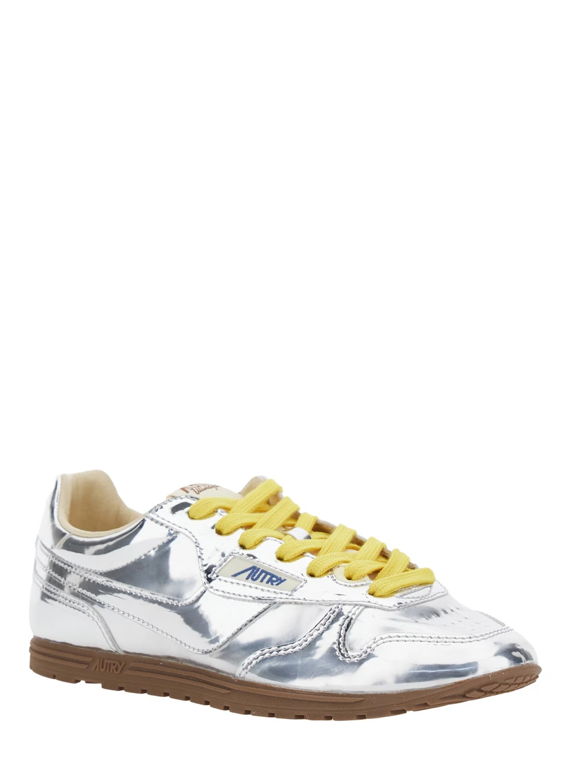 Windspin Low Silver Colored Sneaker with Logo on the Side in Shiny Fabric Woman