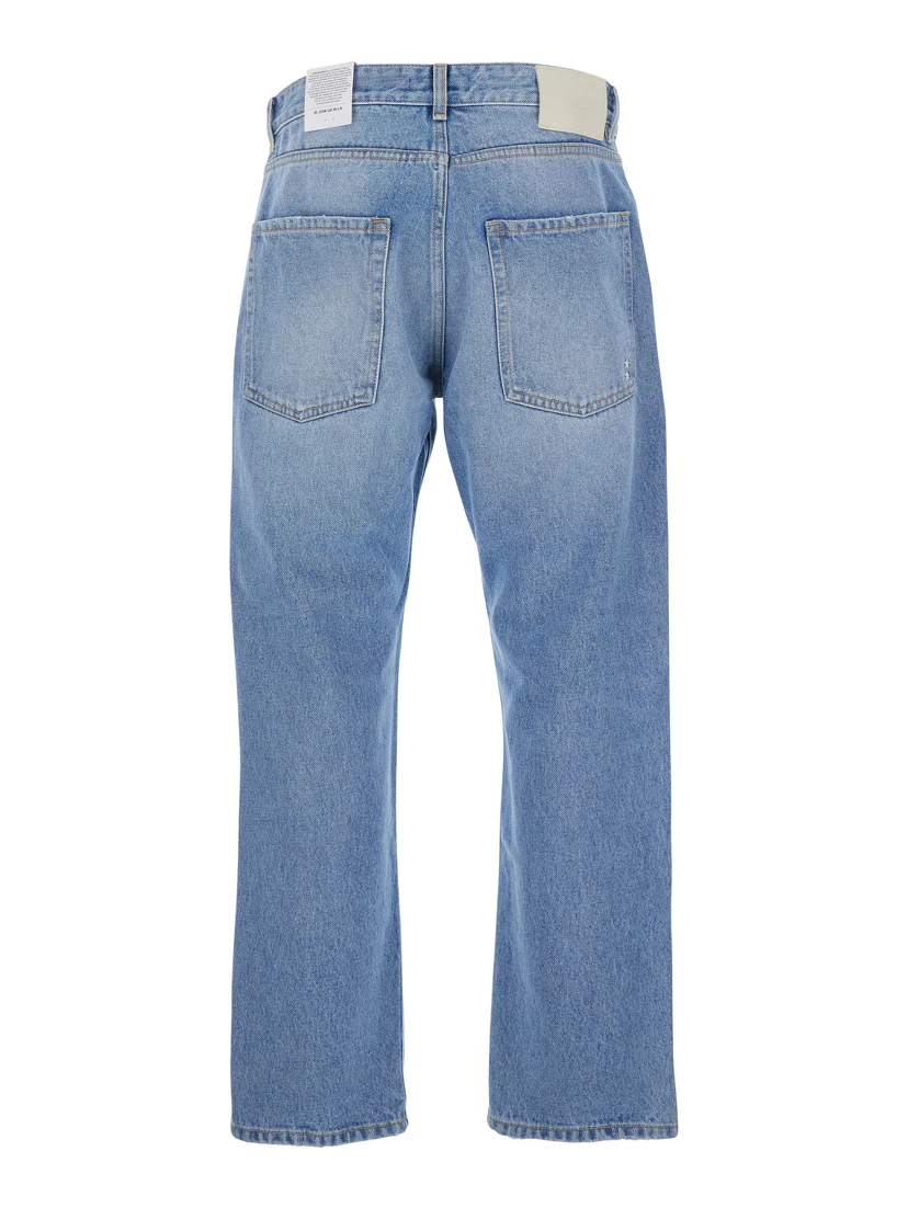 Light Blue Jeans with Logo Patch on the Rear in Denim Man