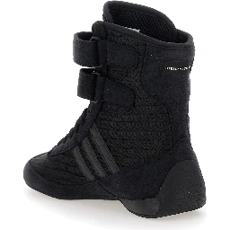 حذاء رياضي أسود من راسانت، مزود بحزام للإغلاق وشعار جانبي، مصنوع من قماش تقني، للنساء