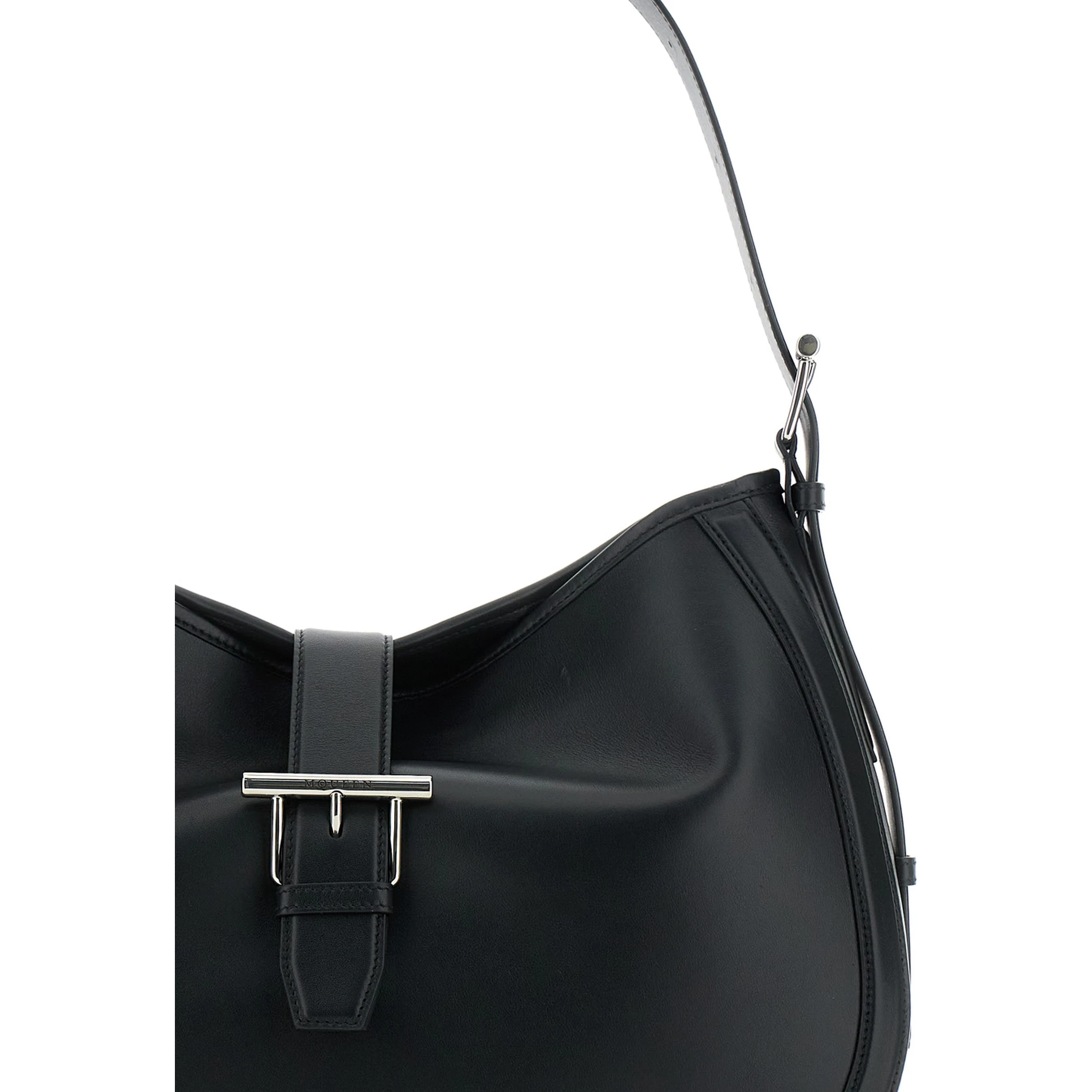 Black Shoulder Bag with Adjustable Shoulder Strap and T Buckle Closure on the Front in Leather Woman