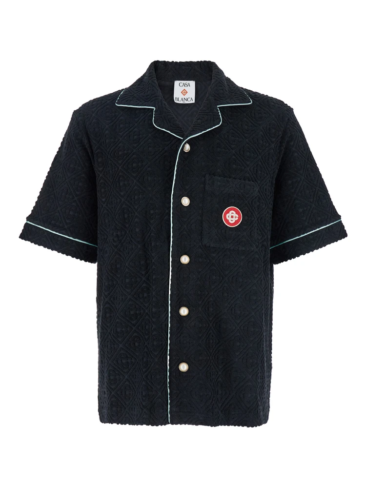 Black Shirt with Classic Lapels and All-Over Embossed Monogram in Cotton Man