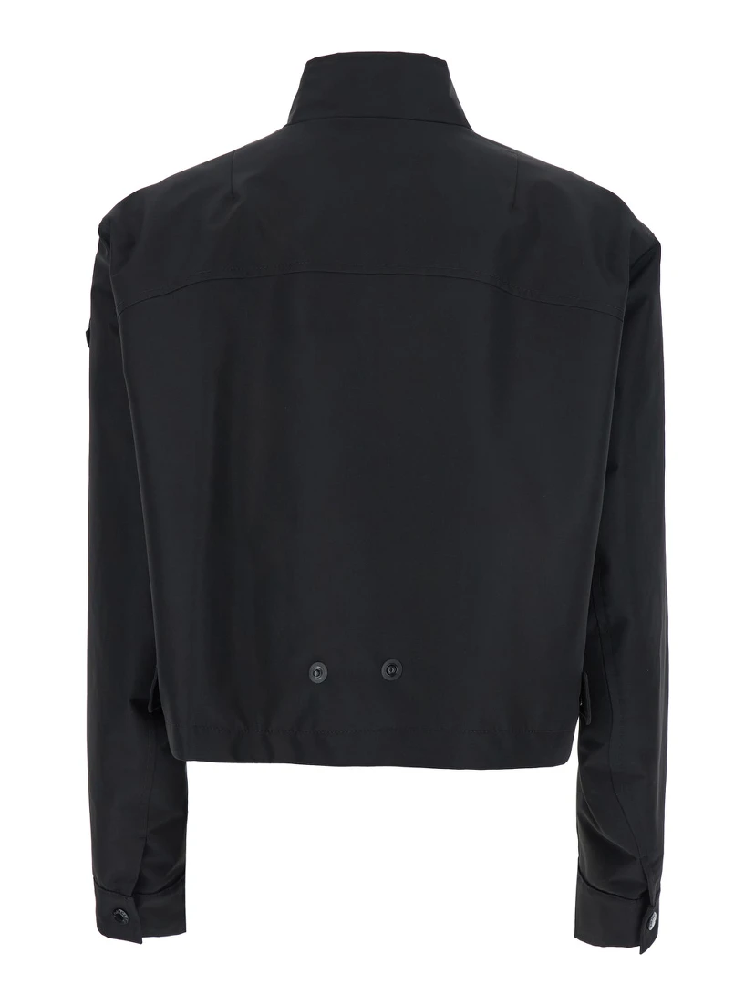 Krovanh Black Down Jacket with High Neck and Logo Patch on the Sleeve in Tech Fabric Woman