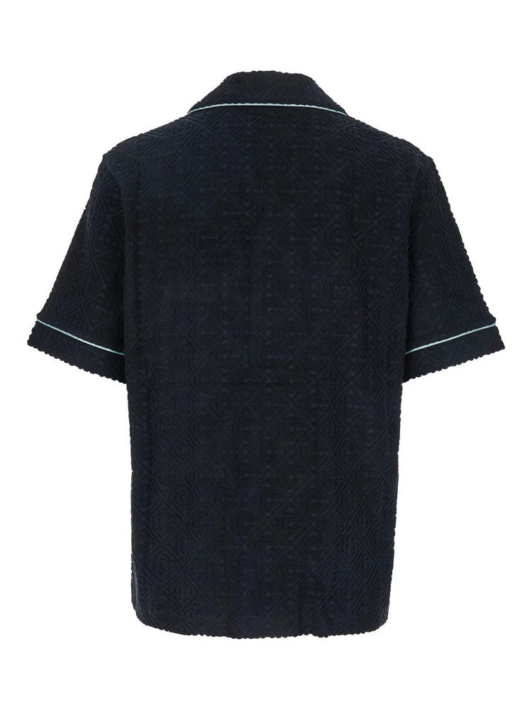 Black Shirt with Classic Lapels and All-Over Embossed Monogram in Cotton Man alternative