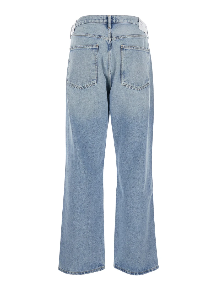 Light Blue Jeans with Ripped Details on the Front and Logo Patch on the Front in Denim Man