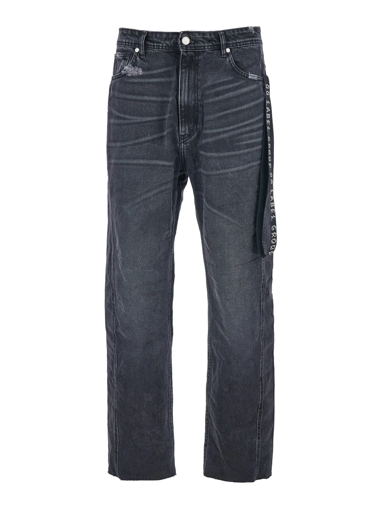 Black Jeans with Logo Patch on the Rear and Side Strap with Logo in Denim Man