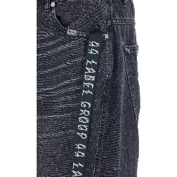 Black Jeans with Logo Patch on the Rear and Side Strap with Logo in Denim Man