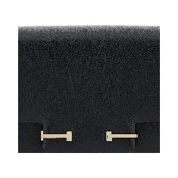 حقيبة كروس سوداء بحزام كتف قابل للتعديل وإغلاق على شكل حرف T من الجلد المحبب للنساء