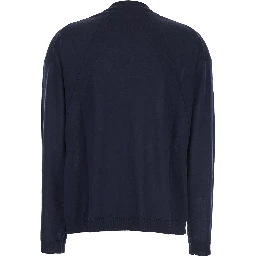 كنزة زرقاء بياقة على شكل حرف V وحواف مضلعة من الصوف للنساء