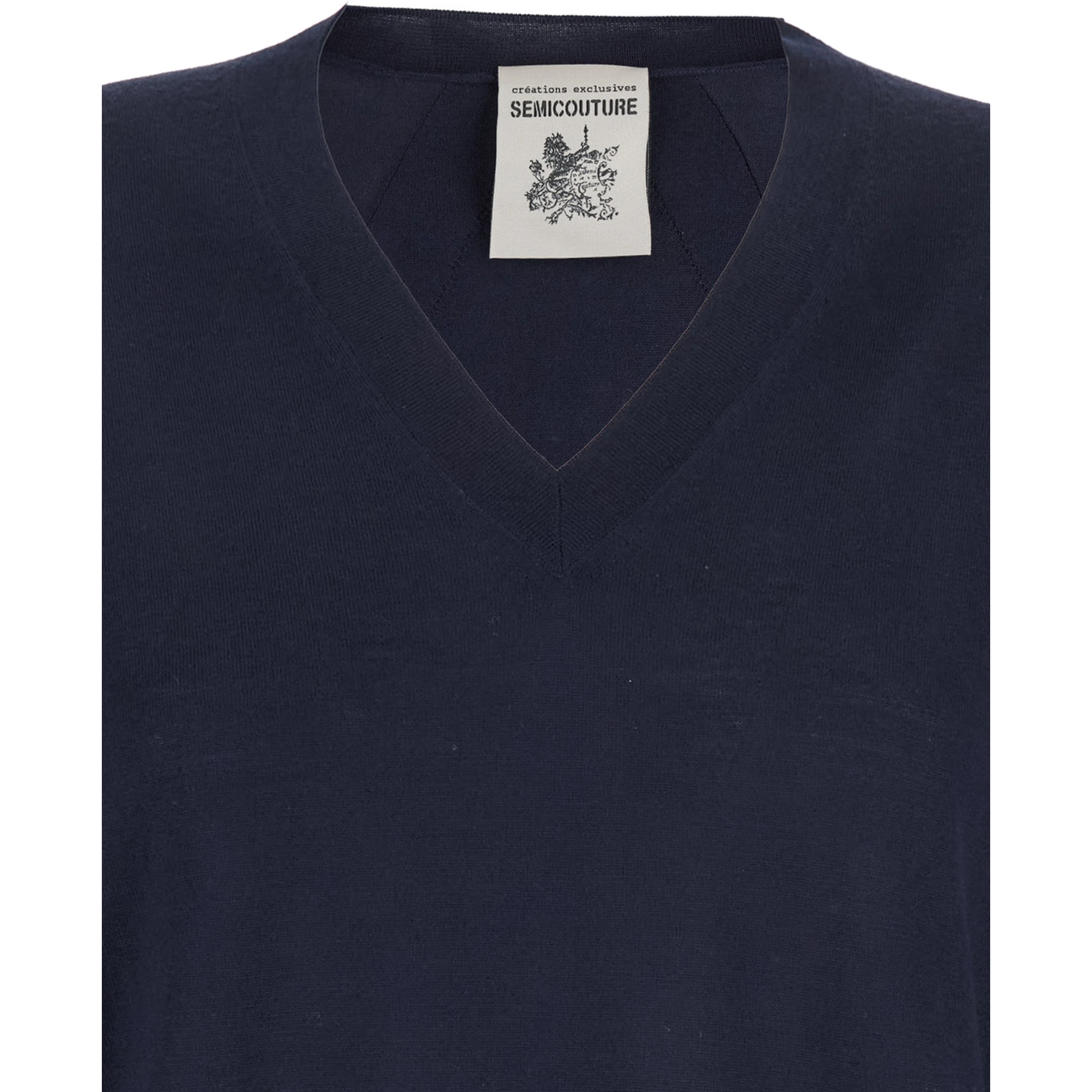 كنزة زرقاء بياقة على شكل حرف V وحواف مضلعة من الصوف للنساء