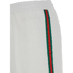 بنطال رياضي أبيض مزين بتطريز شعار وتفاصيل شبكية من البولياميد للنساء