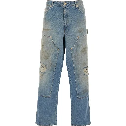 Light Blue Jeans with Ripped Details and Distressed Effect in Denim Man