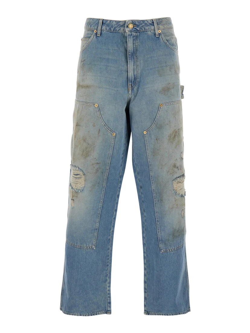Light Blue Jeans with Ripped Details and Distressed Effect in Denim Man