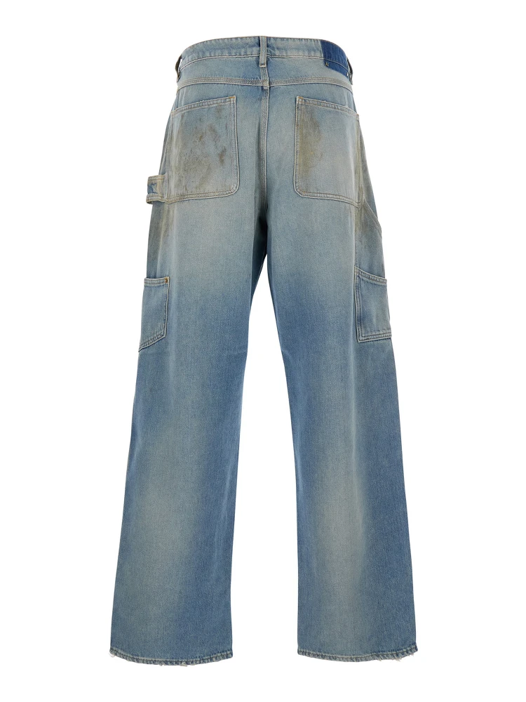 Light Blue Jeans with Ripped Details and Distressed Effect in Denim Man alternative