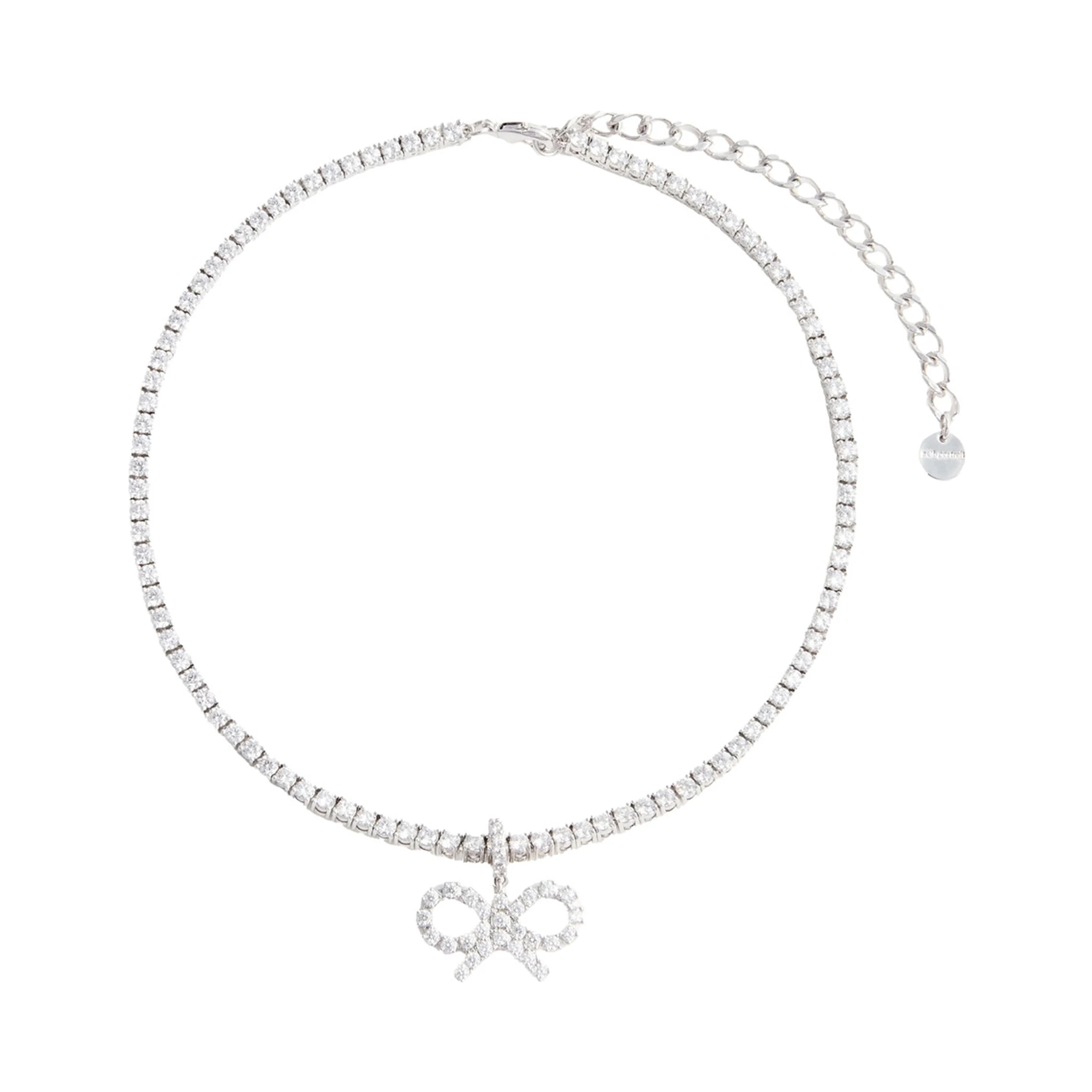 Metallic Tennis Necklace with Bow Charm and Crystal Embellishments in Brass Woman