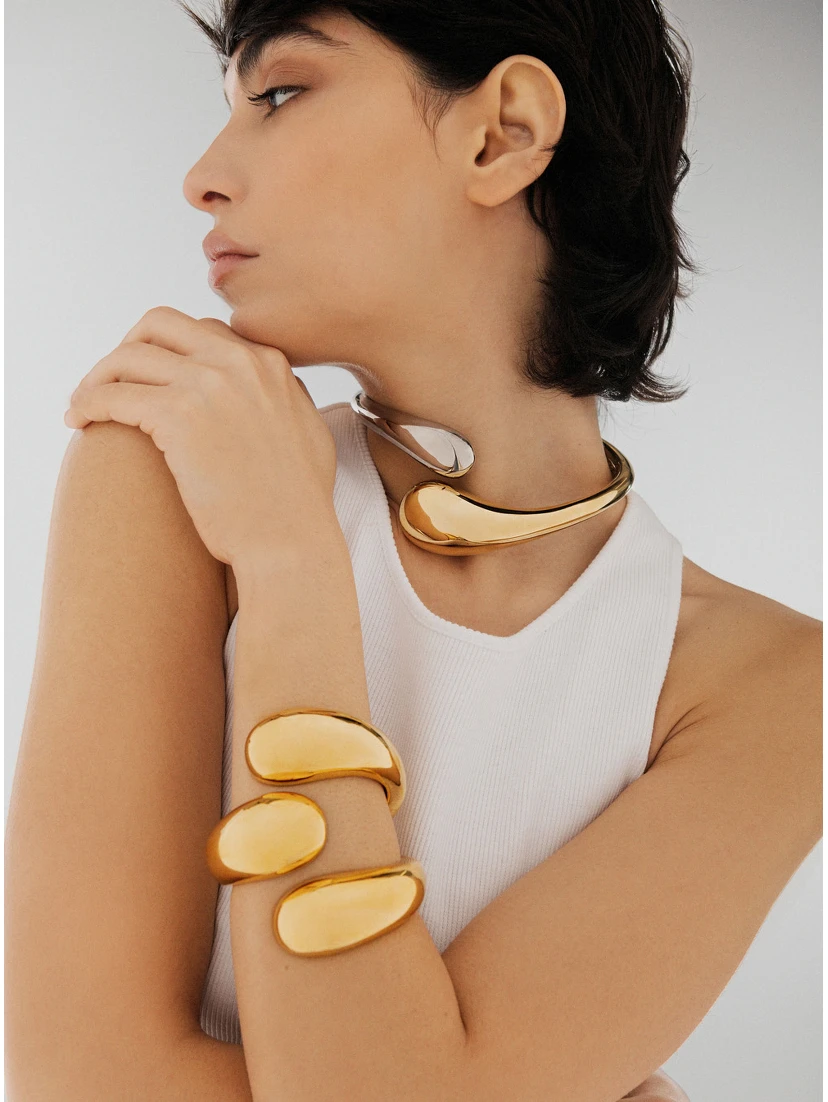 Isa  Gold Colored Bracelet with Spiral Design in Bronze Woman