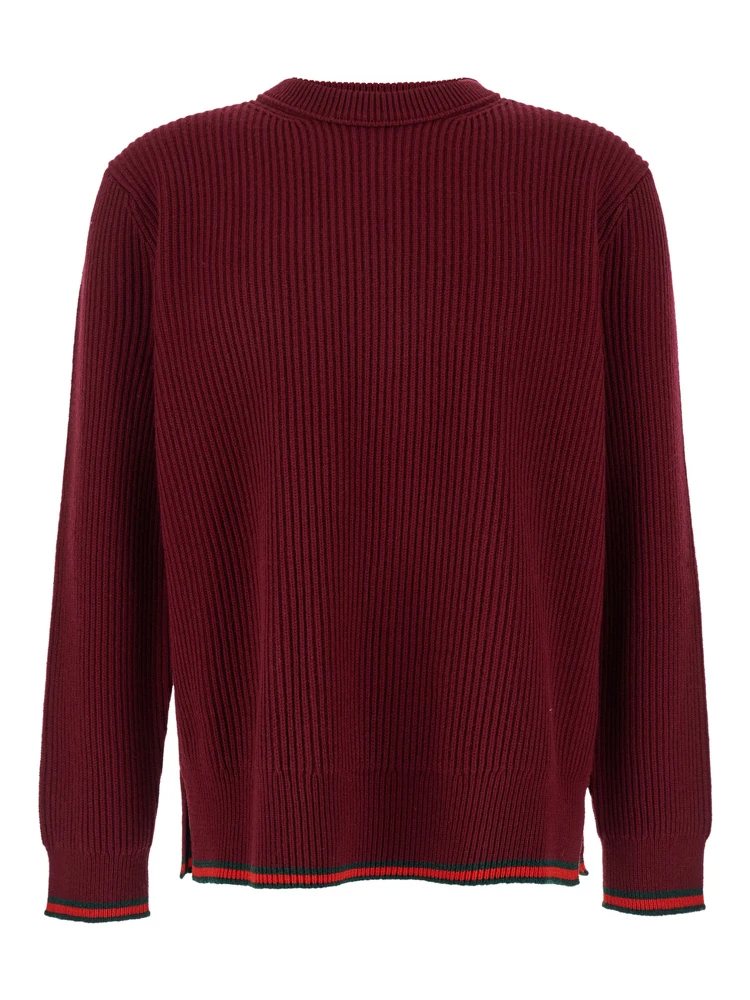 كنزة صوفية حمراء برقبة دائرية وتفاصيل شبكية من مزيج الصوف المضلع للرجال