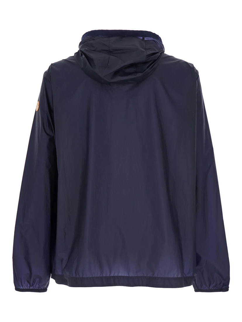 Hamlin Blue Jacket with Logo Plaque on the Zip Puller and Logo Patch on the Sleeve in Tech Fabric Man