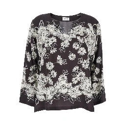 بلوزة بيضاء وسوداء بياقة على شكل حرف V ونقشة زهور كاملة من الحرير للنساء