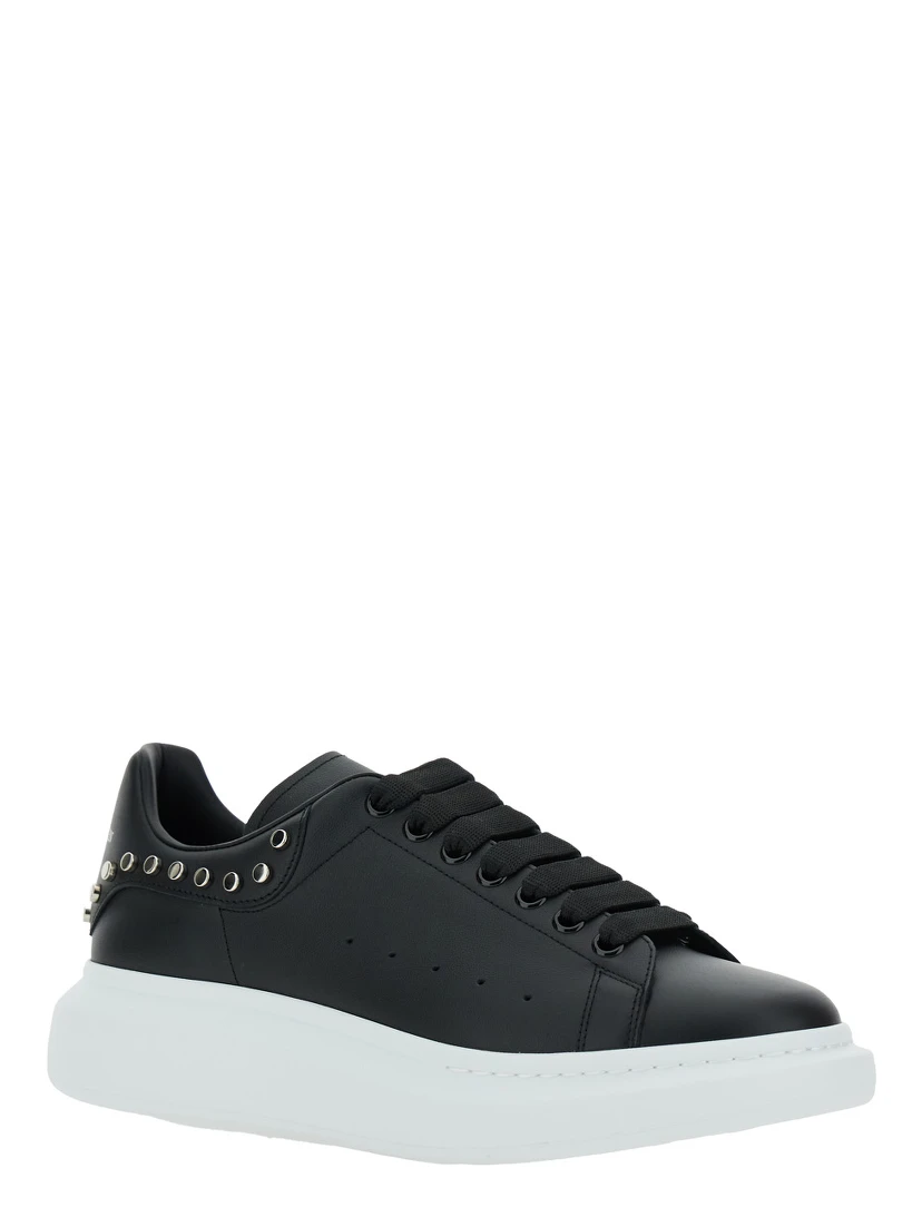 Black Low Top Sneakers with Stud Embellishments in Leather Man