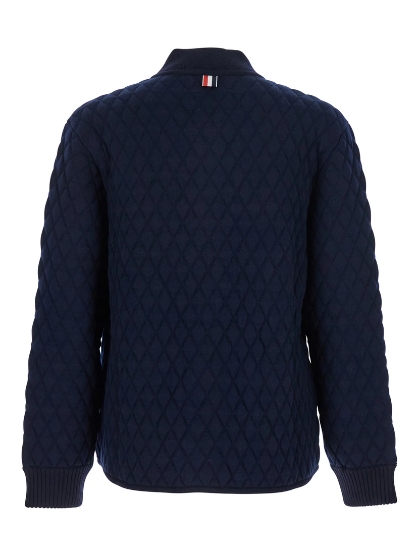 Blue Quilted Jacket with Bomber Collar and Logo Embroidery on the Collar in Wool Man