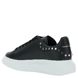 Black Low Top Sneakers with Stud Embellishments in Leather Man