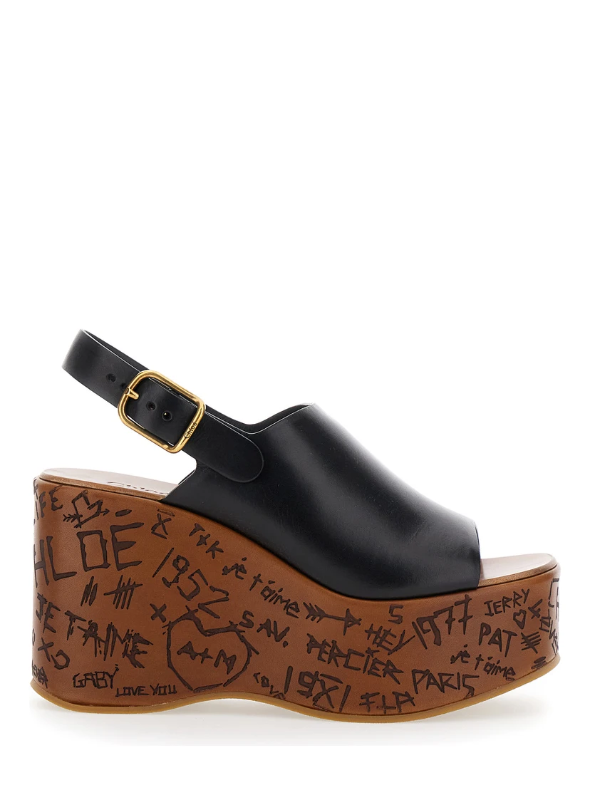Maxime Black Wedge with Engraved Written Decorations and Logo Buckle in Leather Woman