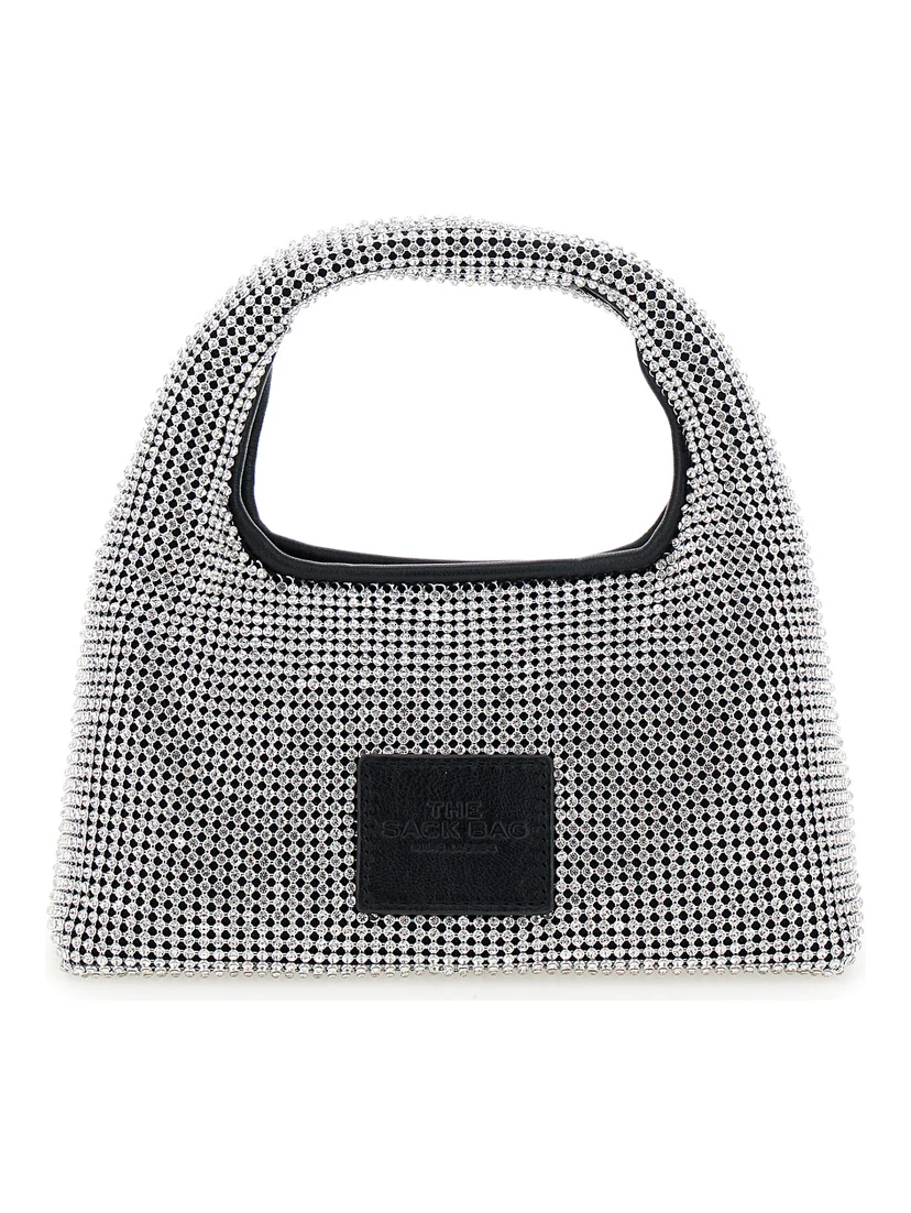 حقيبة يد صغيرة معدنية مزينة بشعار في الخلف ومزينة بالكامل بالكريستال، مصنوعة من قماش تقني نسائي