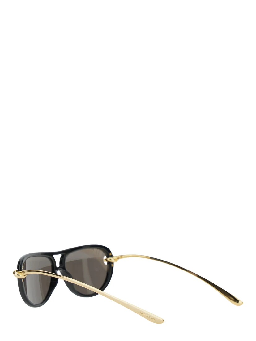 Black Sunglasses with Cut-Out Motif on the Temples and Knot Detail on the Temples in Acetate Woman