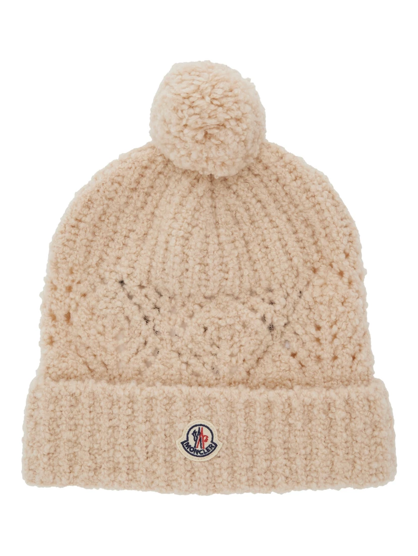 White Beanie with Pompom and Logo Patch on the Front in Wool Girl