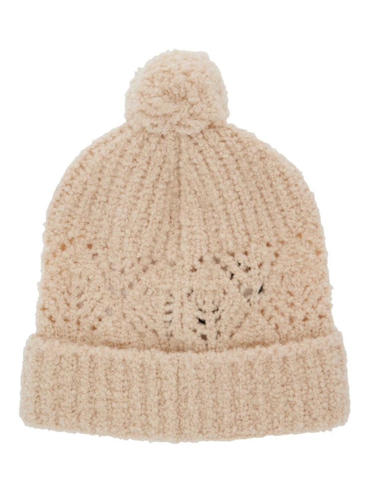 White Beanie with Pompom and Logo Patch on the Front in Wool Girl alternative