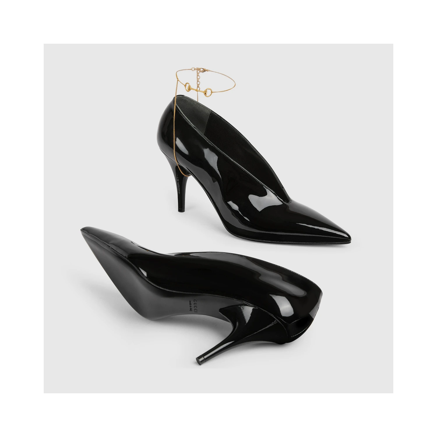 Leather décolletté pumps with jewel