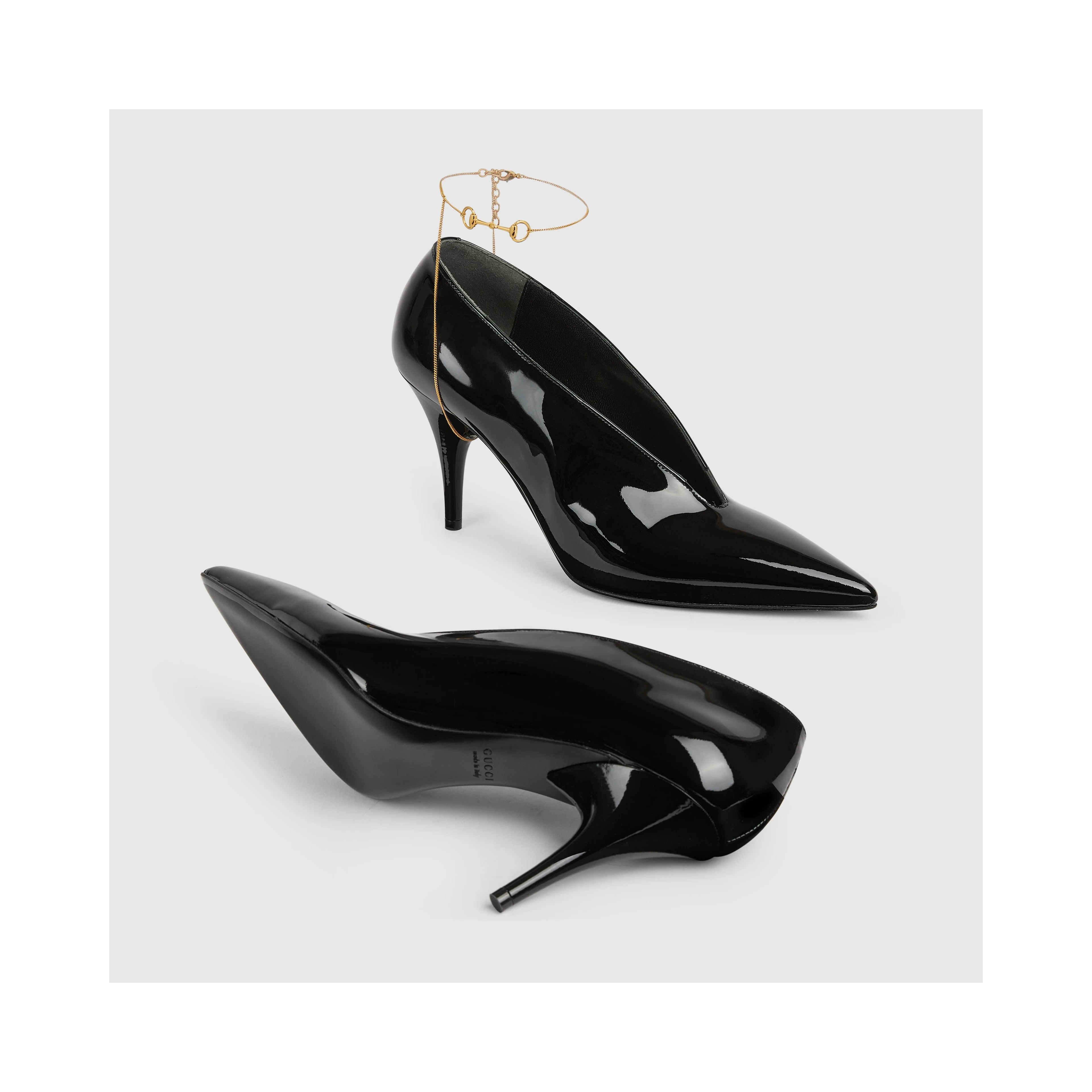 Leather décolletté pumps with jewel