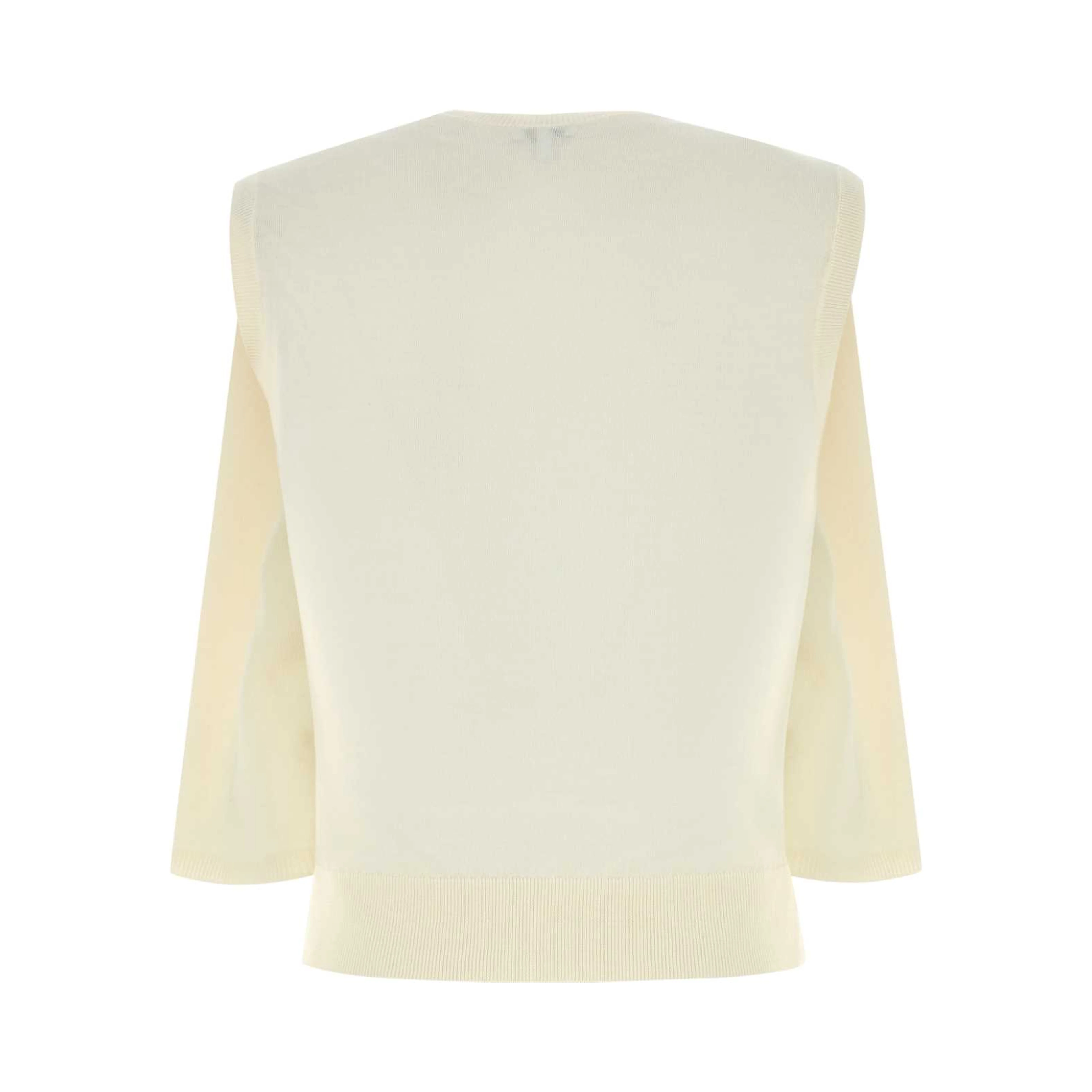 SLEEVELESS SWEATER