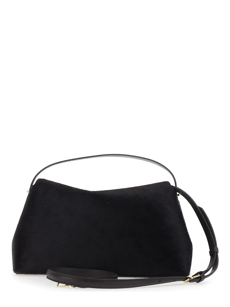 Brown Handbag with Adjustable and Removable Shoulder Strap and T-Lock Closure on the Front in Leather Woman alternative