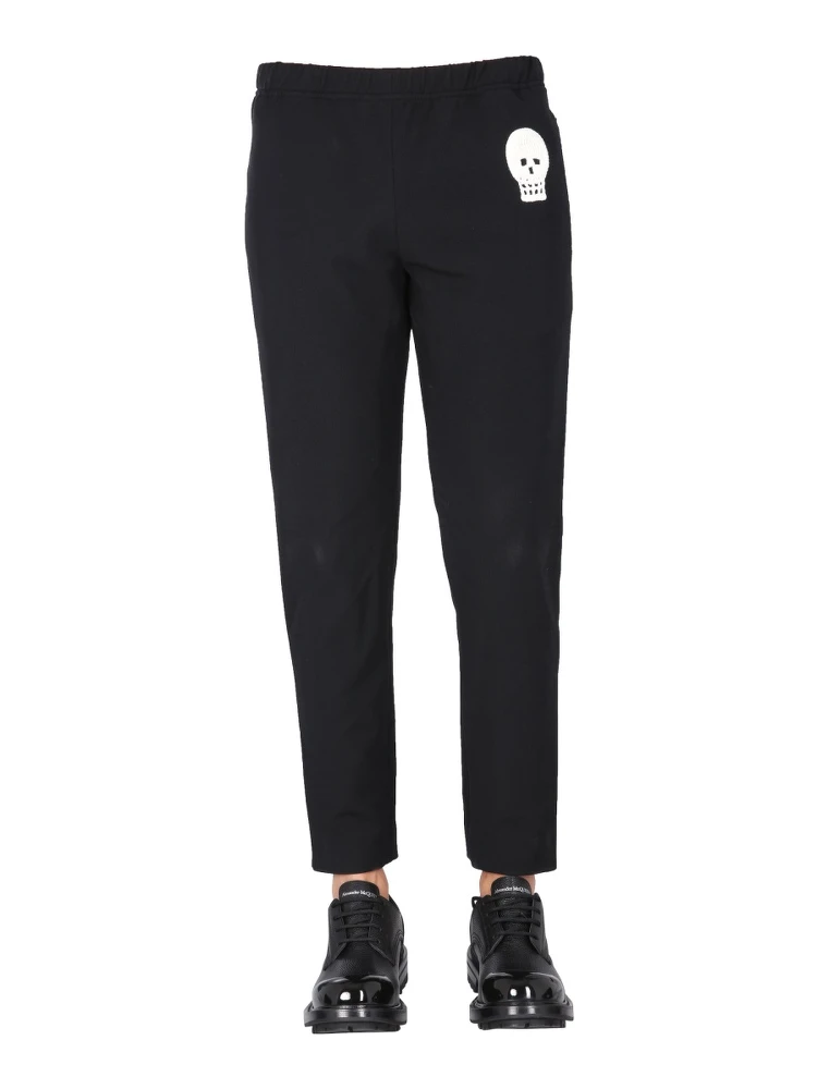 JOGGING PANTS WITH EMBROIDERED SKULL