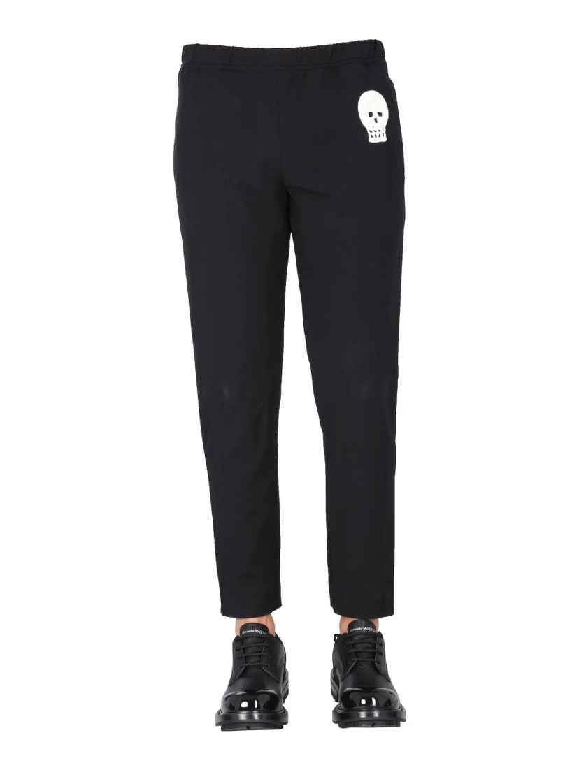 JOGGING PANTS WITH EMBROIDERED SKULL