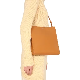 LONG ASYMMETRIC SWEATER