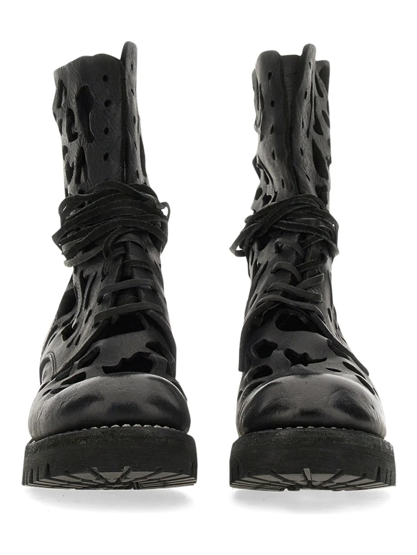 ANKLE BOOT WITH CUT OUT DETAILS